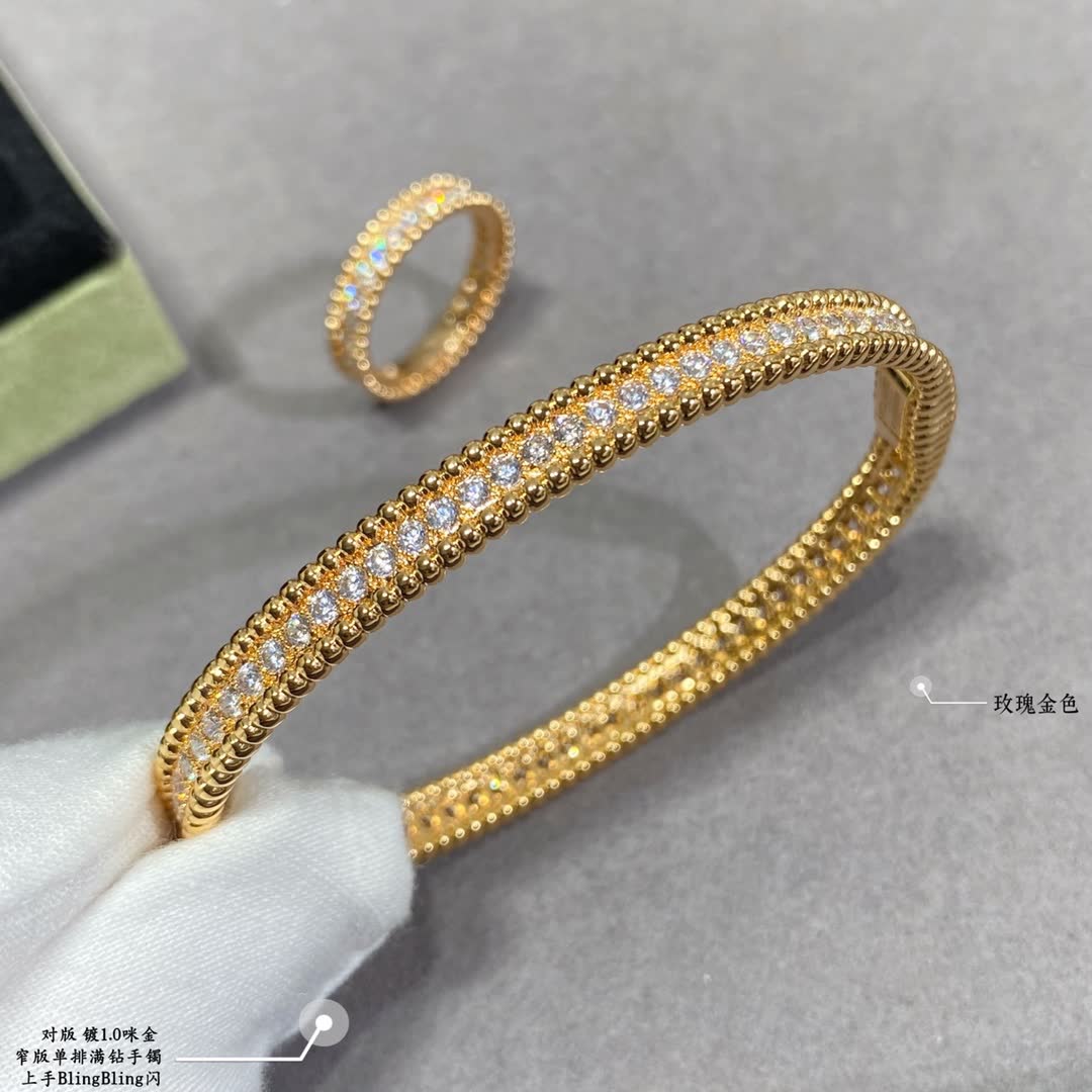 Van Cleef & Arpels Silver Diamante Flower Bangle Set